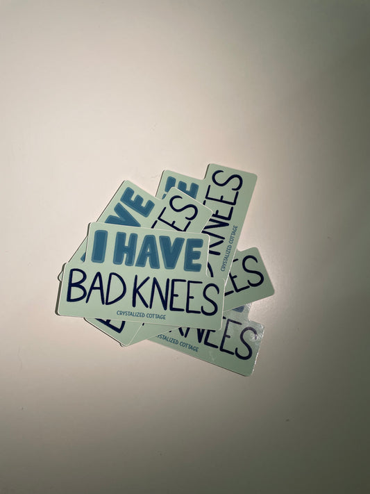 Vinyl sticker in teal colors says I have bad knees